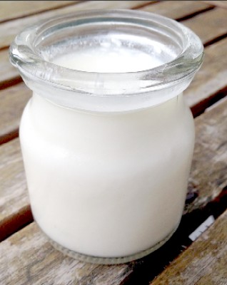 Jar of Milk on a Wooden Platform